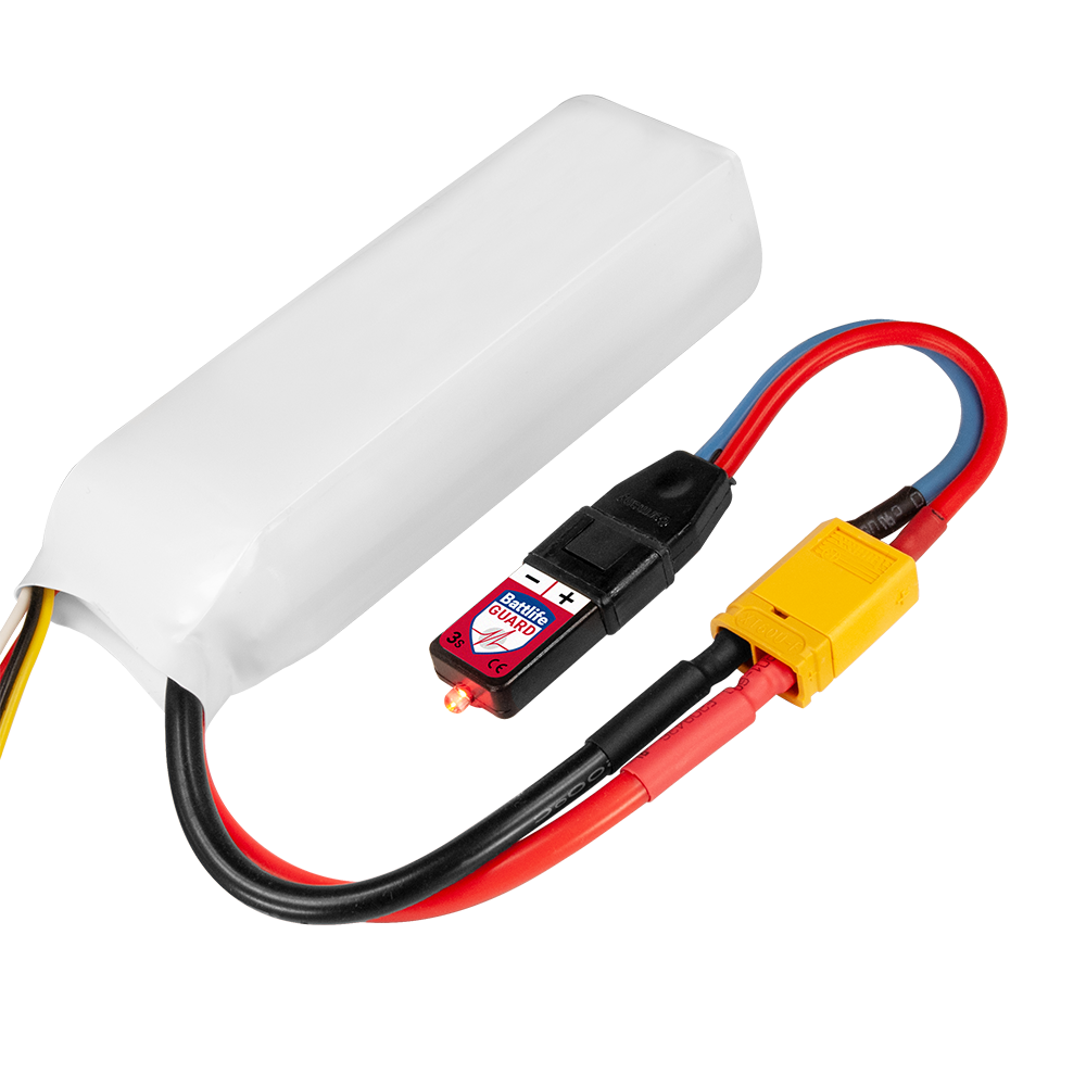 PowerBox Batt Life Guard 3S connected to a 3S LiPo through an XT60 adaptor lead, LED lit while discharging
