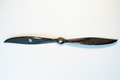 PT Model 23x20 rear contra carbon fibre propeller full length on white studio background